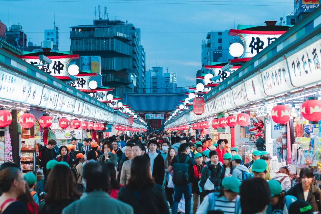 busy market street with many shoppers