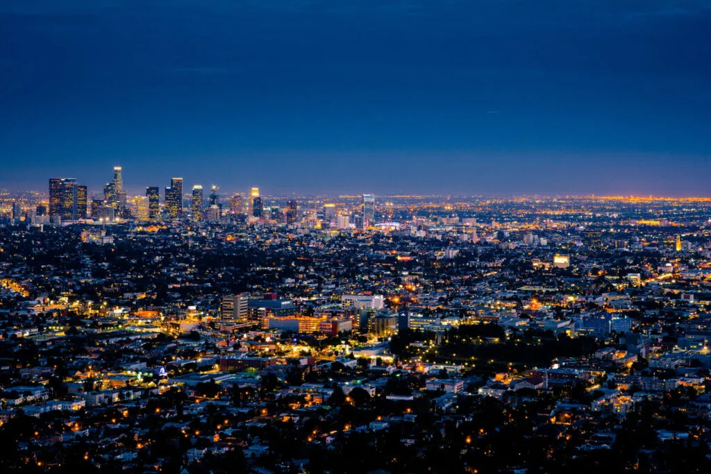 the city of los angeles at night from a hill