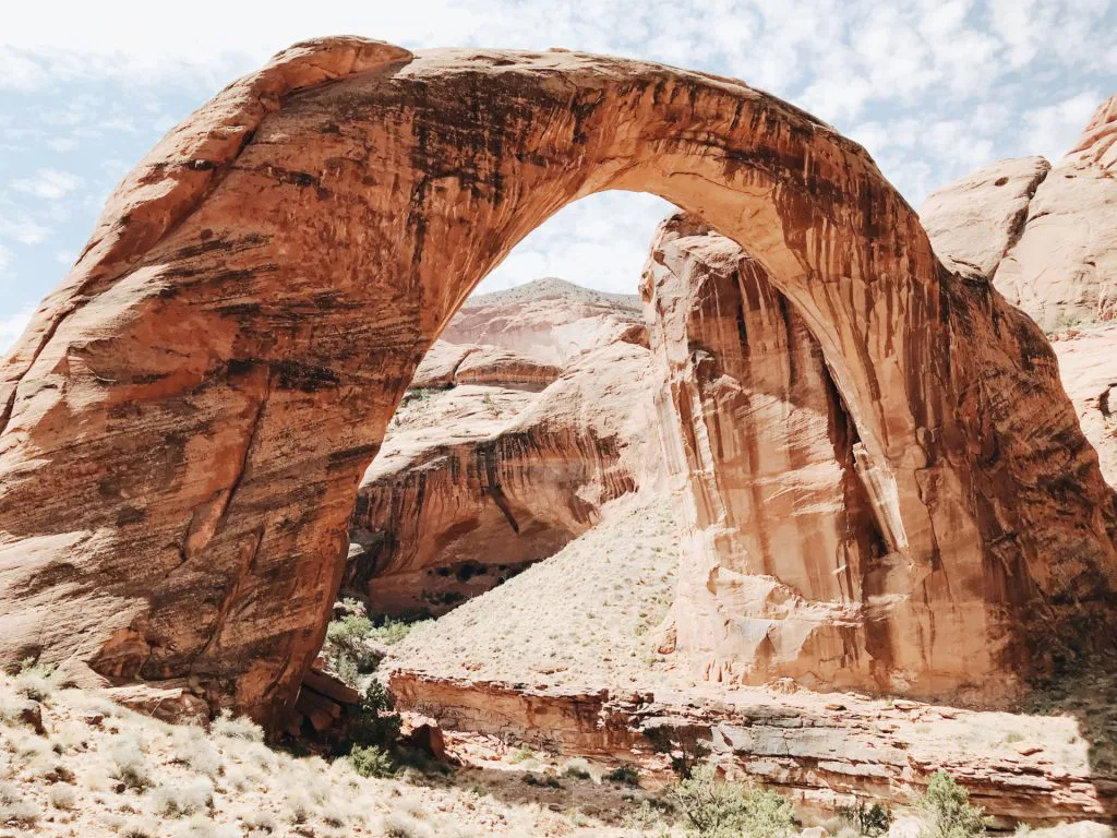 landscape picture of natural rock arch in the desert