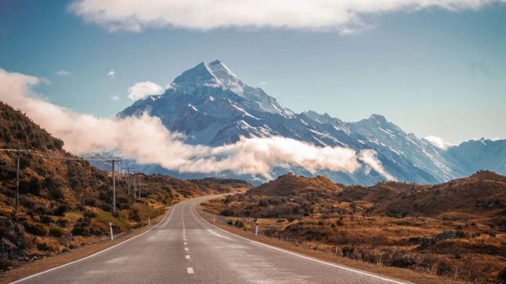 road heading towards a snowy mountain